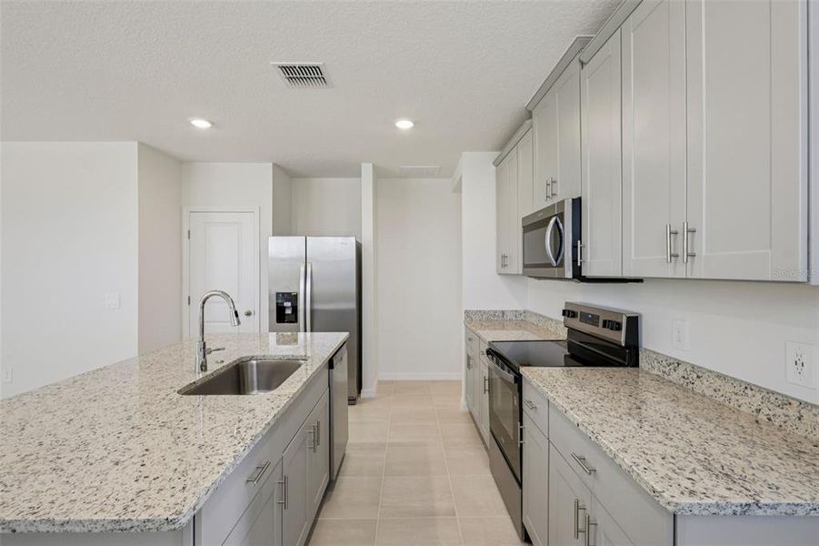 Furnished interior view inside a new home in , Haines City (Image 12). Furnished interior view inside a new home in , Haines City (Image 12).