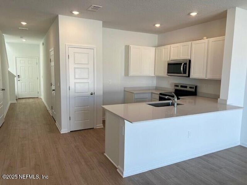 Furnished interior view inside a new home in The Landing, Middleburg (Image 12).