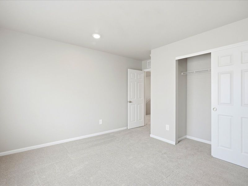Spacious, unfurnished interior of a new home in Poudre Heights: The Lakes Collection, Windsor (Image 18). Spacious, unfurnished interior of a new home in Poudre Heights: The Lakes Collection, Windsor (Image 18).