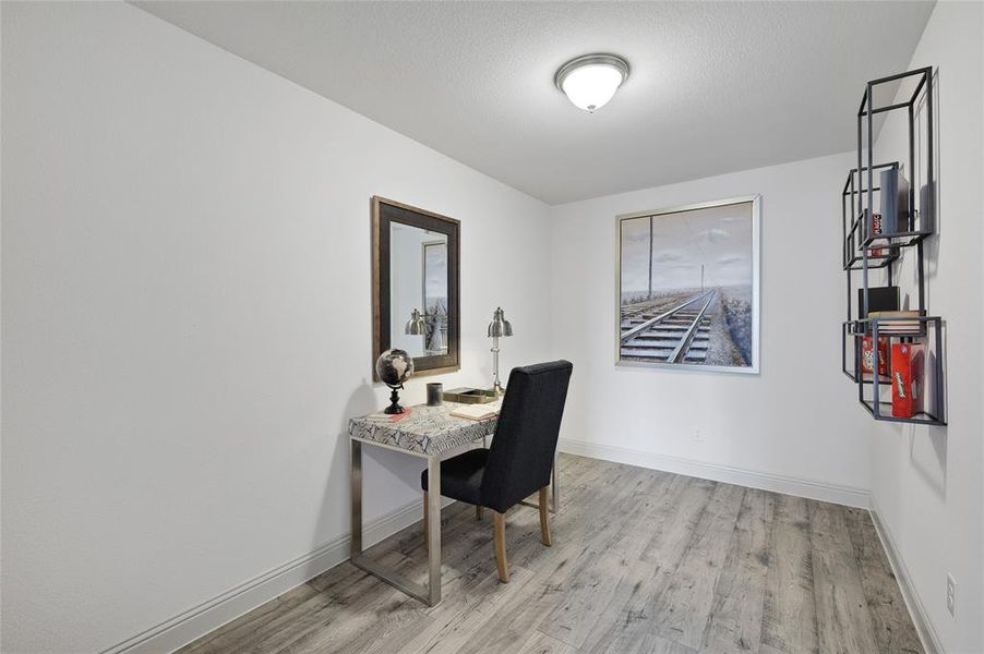 Office featuring light hardwood / wood-style floors