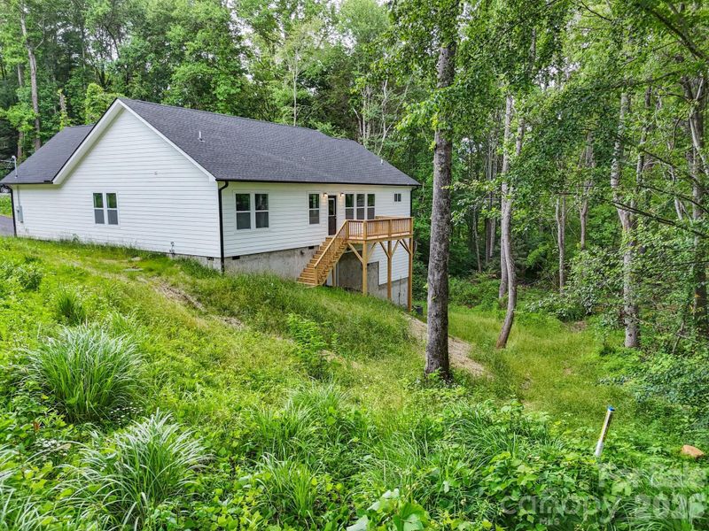 Exterior details and patio area of a home in , Black Mountain (Image 24). Exterior details and patio area of a home in , Black Mountain (Image 24).