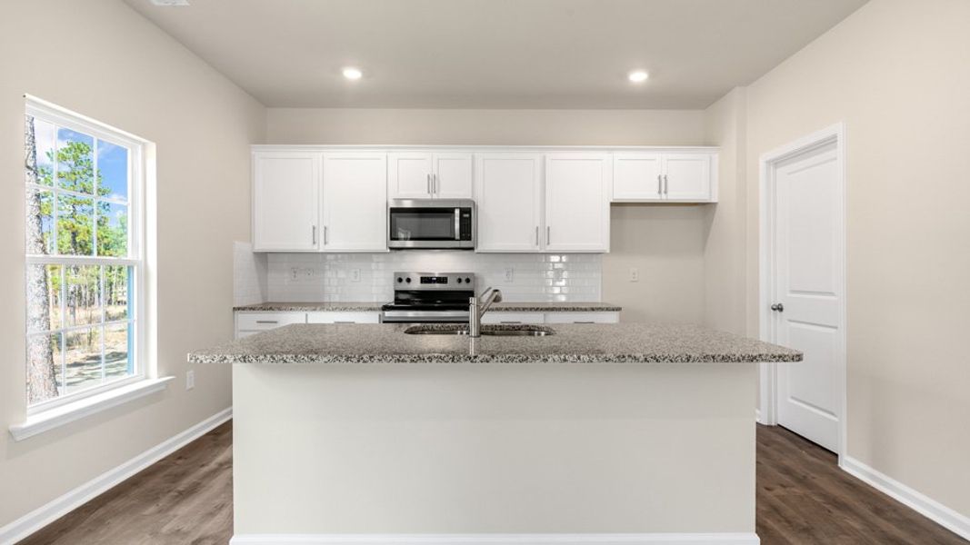 Furnished interior view inside a new home in Villa Grande, Winterville (Image 6).