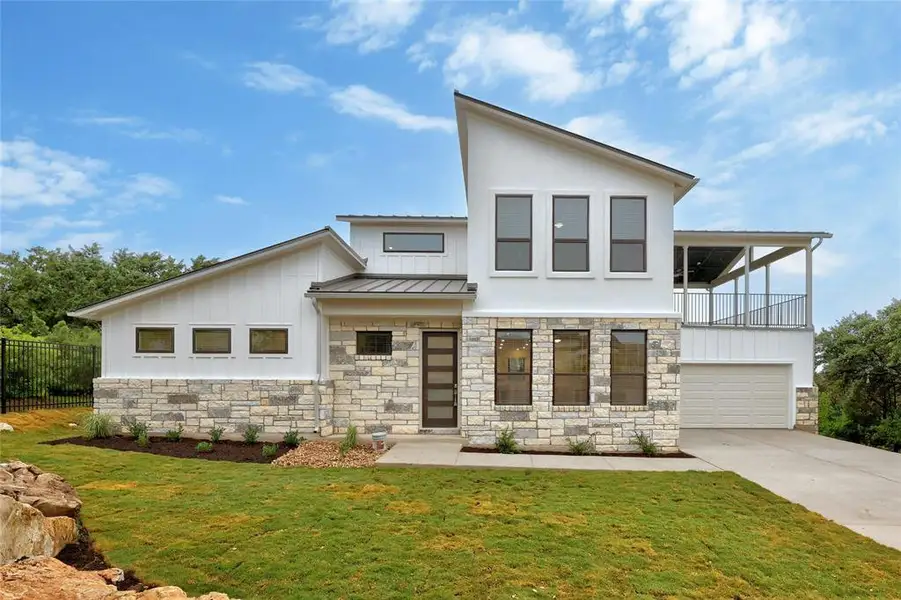 Front exterior of a home in the Horseshoe Bay community, located in Horseshoe Bay, TX (Image 2).
