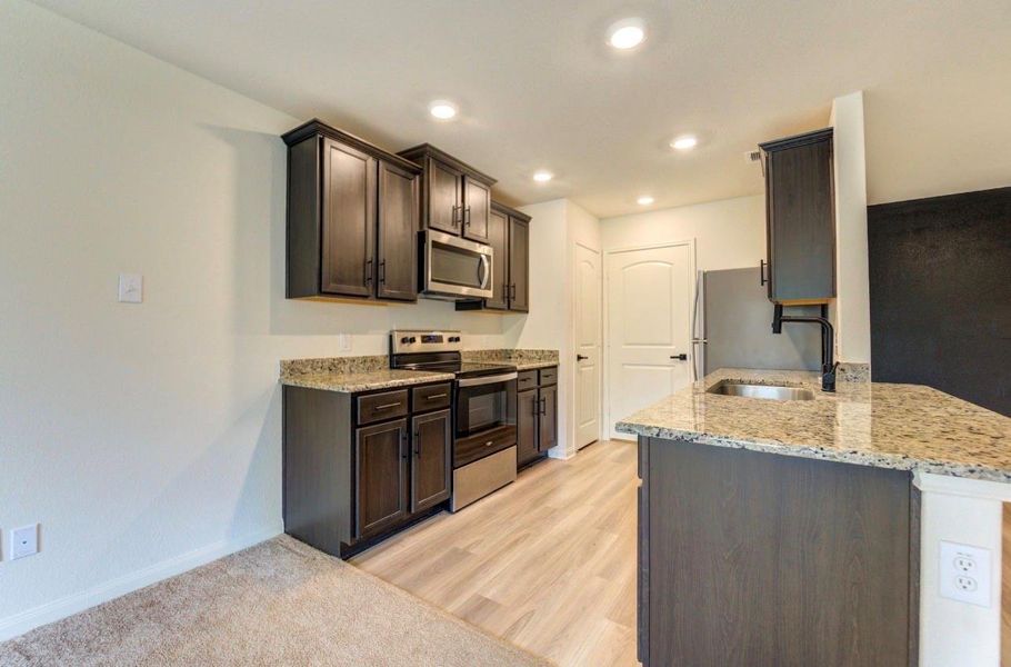 Furnished interior view inside a new home in Williams Trace, Magnolia (Image 12).