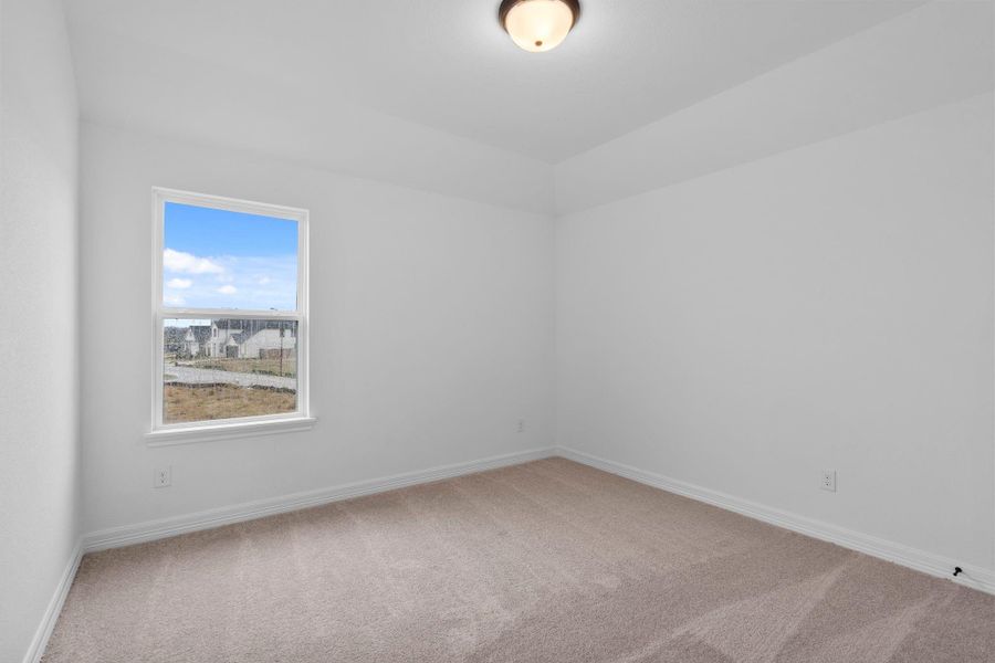 An inviting secondary bedroom that balances modern finishes with livable versatility. An inviting secondary bedroom that balances modern finishes with livable versatility.