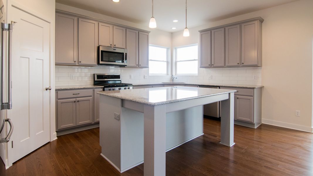 Representative furnished interior of a home built from the The Hartland by Norfolk Homes in Coronado Estates, Jackson (Image 38).