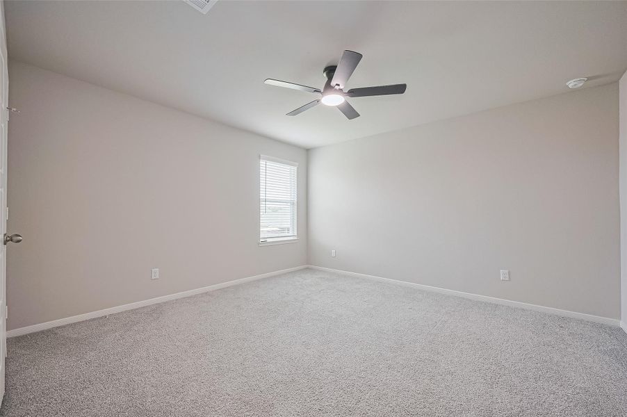 Spacious, unfurnished interior of a new home in Sunterra, Katy (Image 32).