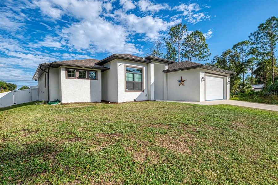 Exterior details and patio area of a home in , North Port (Image 27).