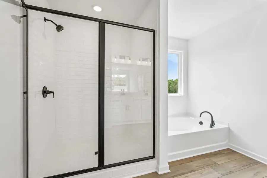 Representative Photo: Primary Bathroom Walk-In Shower & Soaking Tub Representative Photo: Primary Bathroom Walk-In Shower & Soaking Tub