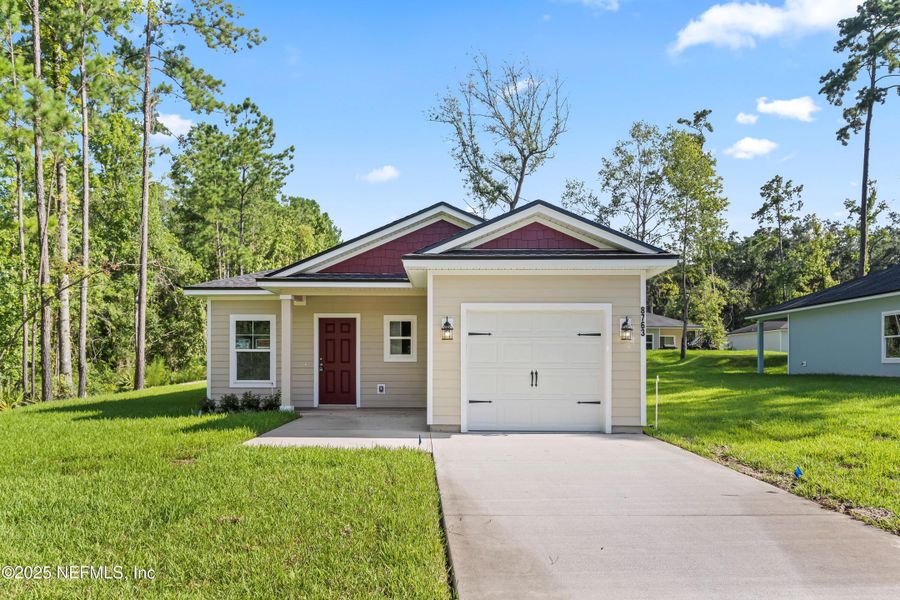 Front exterior of a new home in , Jacksonville, FL, highlighting curb appeal (Image 2).