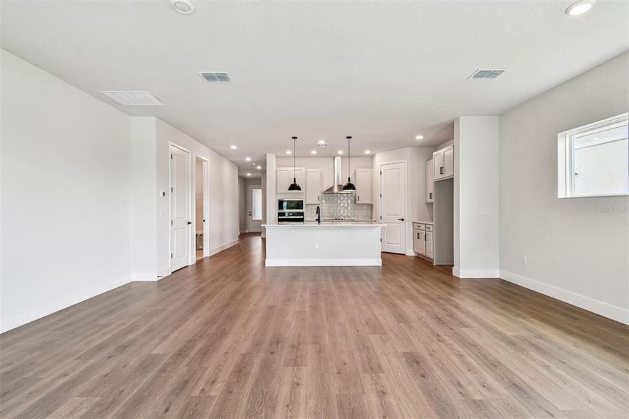 Spacious, unfurnished interior of a new home in North River Ranch – Garden Series, Parrish (Image 26).