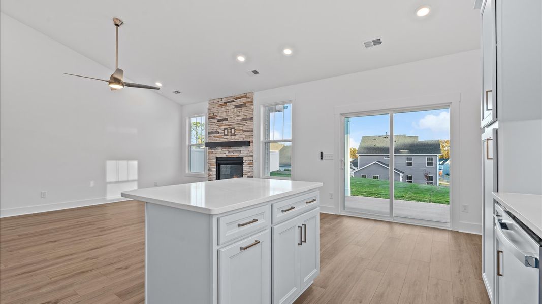 Stylish and efficient kitchen with a modest island and sleek, current design