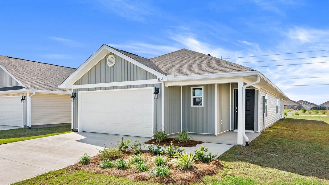 Front exterior of a new home in Titus Park, Panama City, FL, highlighting curb appeal (Image 2).