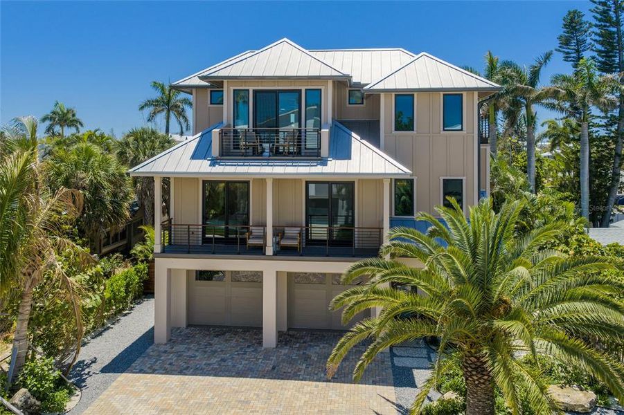 Front exterior of a new home in , Anna Maria, FL, highlighting curb appeal (Image 24). Front exterior of a new home in , Anna Maria, FL, highlighting curb appeal (Image 24).