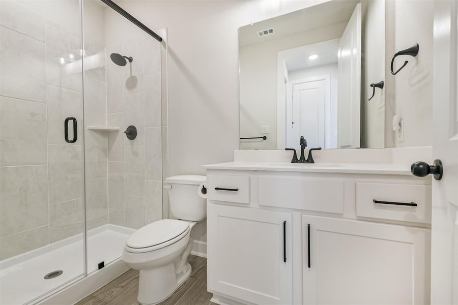 Furnished interior view inside a new home in The Woodlands Hills – 55', Willis (Image 28).