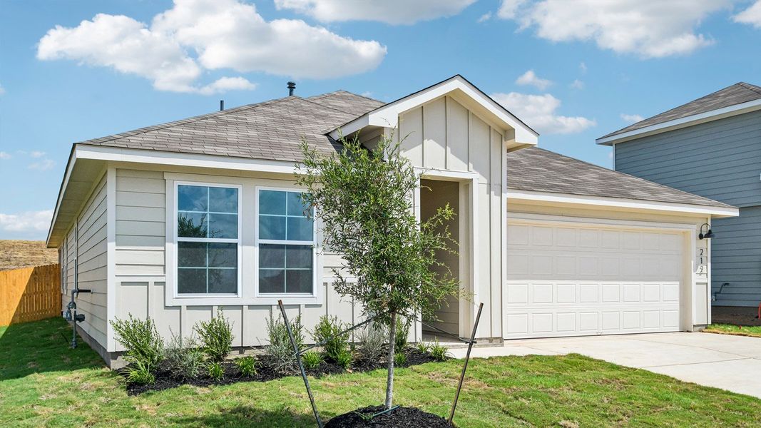 Front exterior of a new home in Prairie Lakes, Buda, TX, highlighting curb appeal (Image 17).