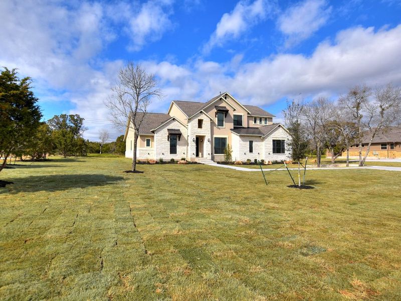 Representative exterior photo of a completed home built from the Madera II by Giddens Homes in Scofield Farms Estates, Georgetown, TX (Image 36).