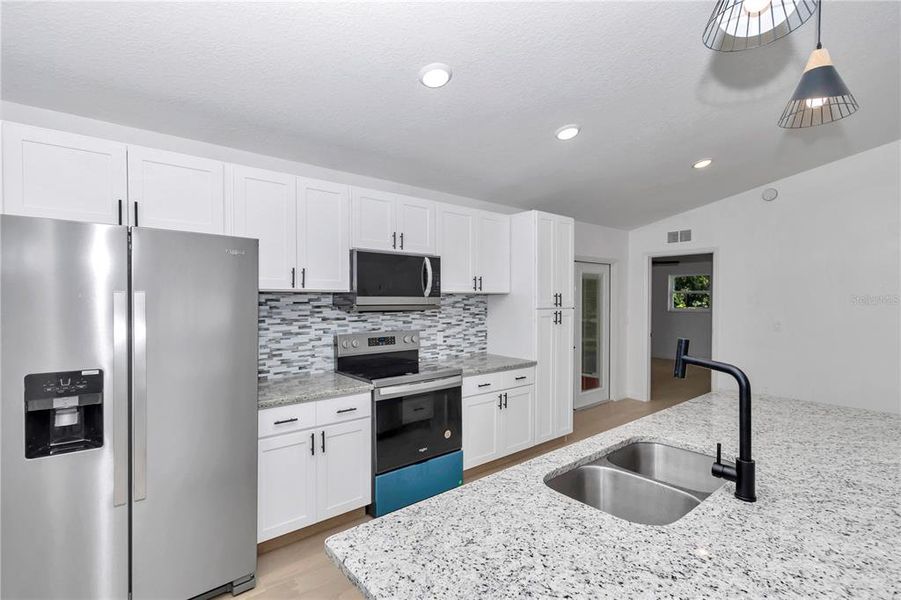 Furnished interior view inside a new home in , Dunnellon (Image 7).