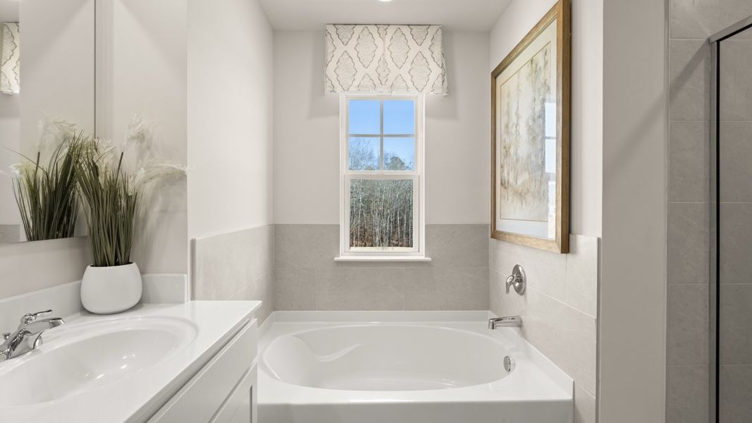 Representative furnished interior of a home built from the Hayden by D.R. Horton in Champion's Run, Lithonia (Image 12).