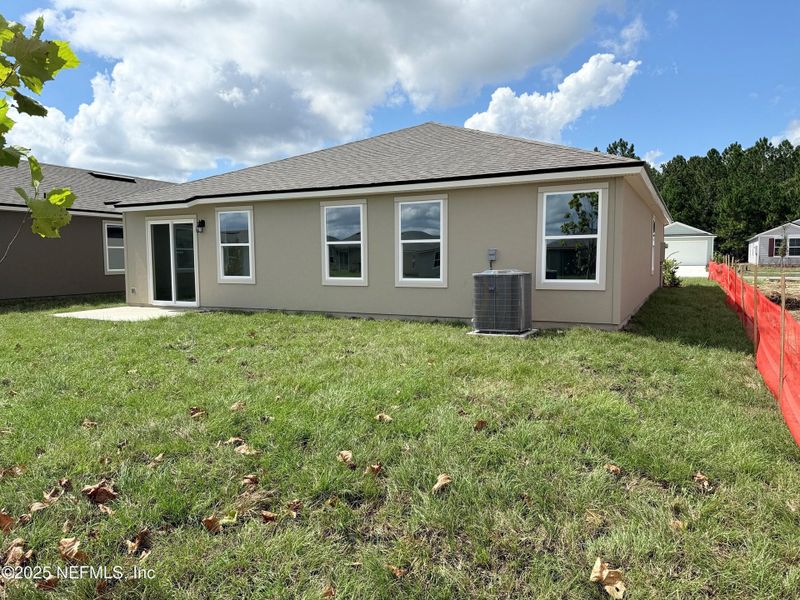 Exterior details and patio area of a home in The Arbors, Jacksonville (Image 3).