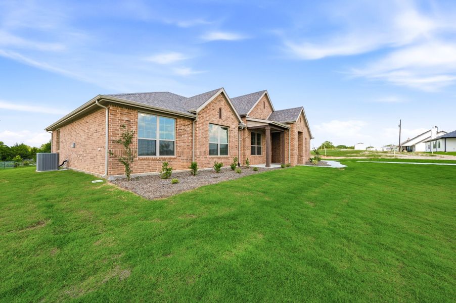 Exterior details and patio area of a home in Saddleback Estates, Boyd (Image 3).