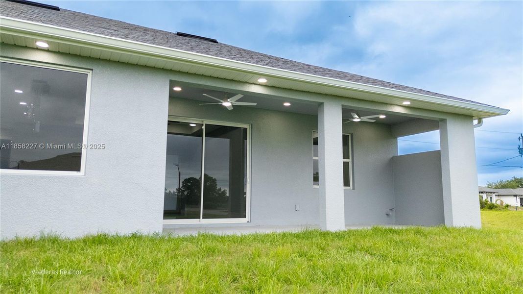 Front exterior of a new home in , Lehigh Acres, FL, highlighting curb appeal (Image 2).