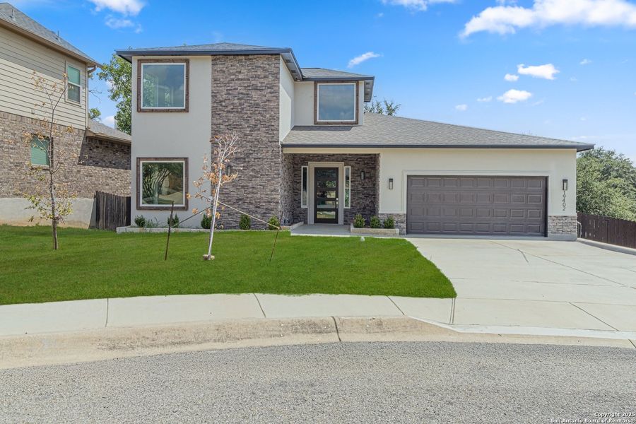 Front exterior of a new home in , San Antonio, TX, highlighting curb appeal (Image 1). Front exterior of a new home in , San Antonio, TX, highlighting curb appeal (Image 1).
