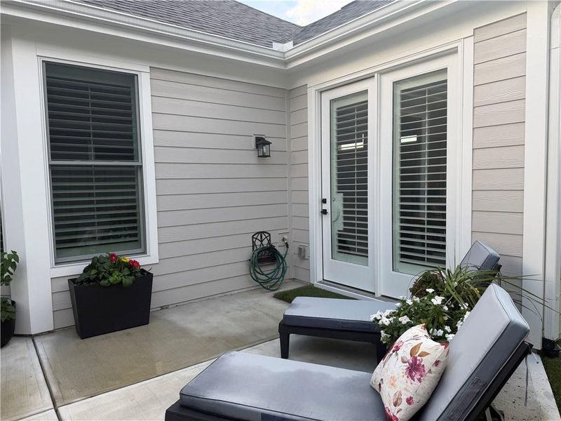 Exterior details and patio area of a home in The Courtyards at Bailey Farms, Dacula (Image 28). Exterior details and patio area of a home in The Courtyards at Bailey Farms, Dacula (Image 28).