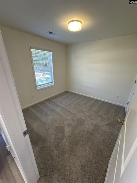 Spacious, unfurnished interior of a new home in Piney Woods Bluff, Columbia (Image 10).