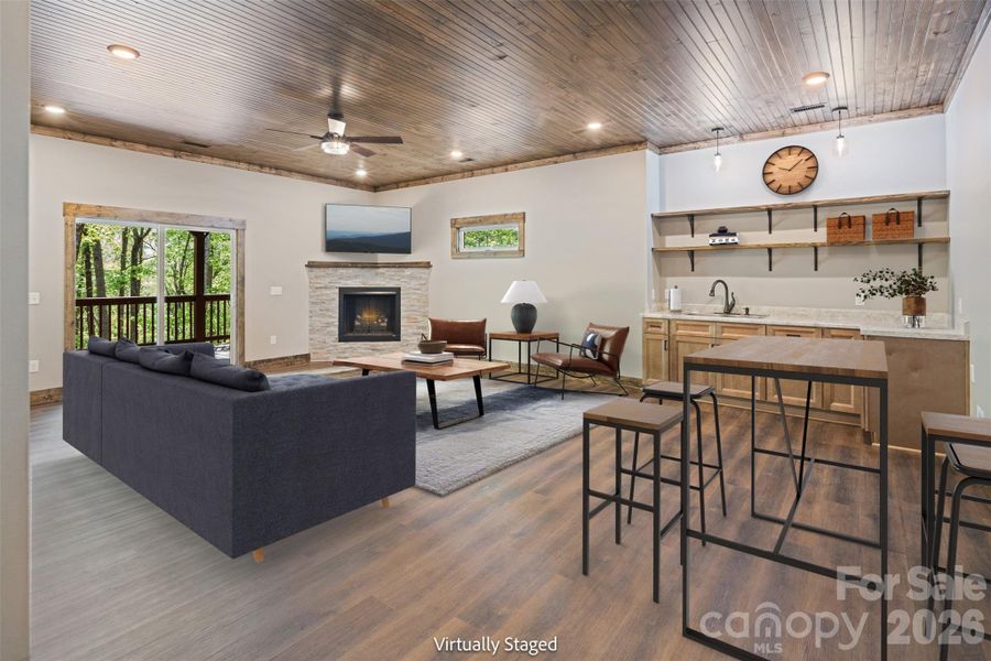 Lower Level - Den with Wet Bar & Gas Log Fireplace - Virtually Staged