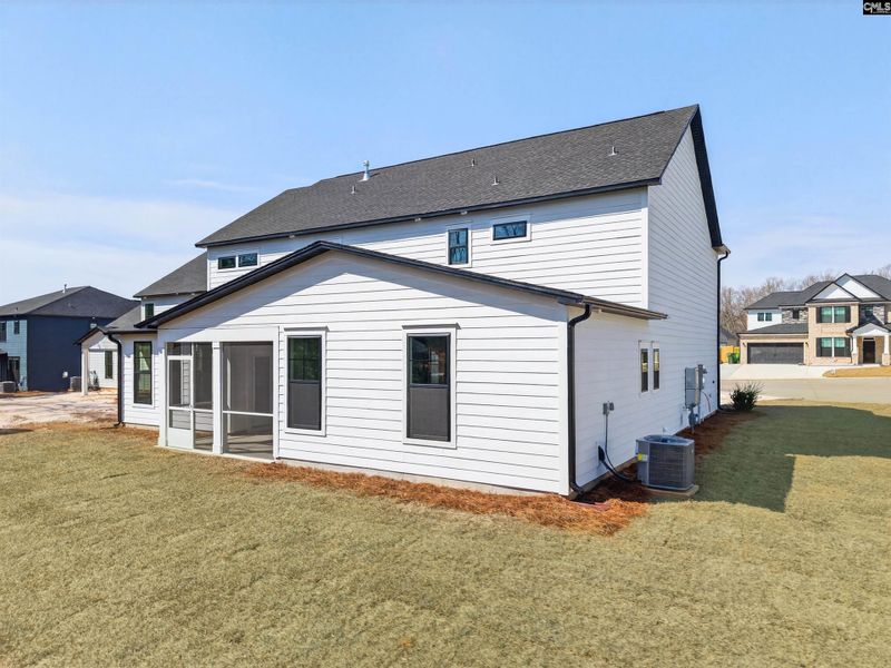 Exterior details and patio area of a home in Collins Cove, Chapin (Image 4).