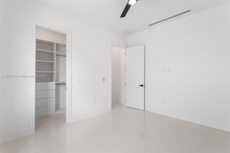 ADDITIONAL GUEST BEDROOM thoughtfully arranged to GIVE EVERYONE THEIR OWN SPACE!