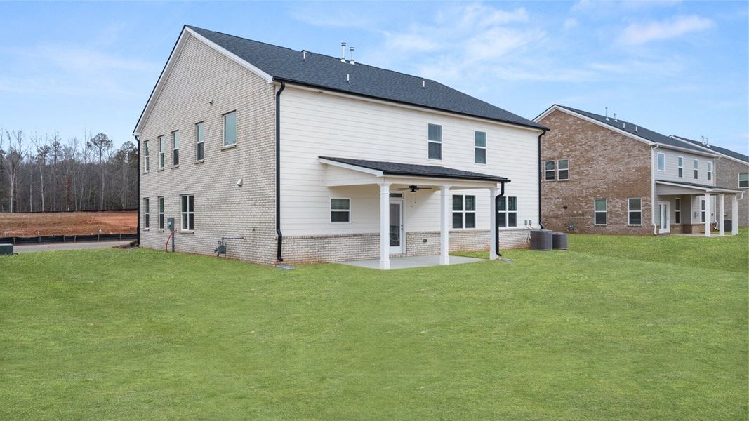 Exterior details and patio area of a home in The Gates at Pates Creek, Hampton (Image 3).