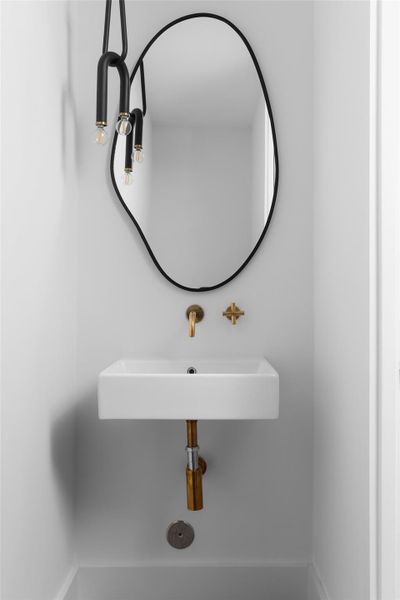 Designer fixtures and finishes define this home.