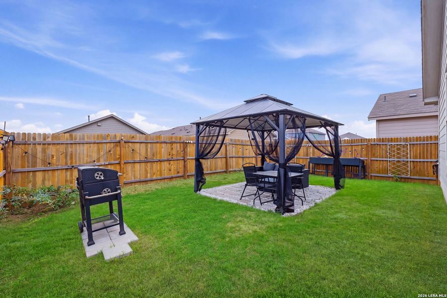Exterior details and patio area of a home in Spring Grove, St. Hedwig (Image 20).