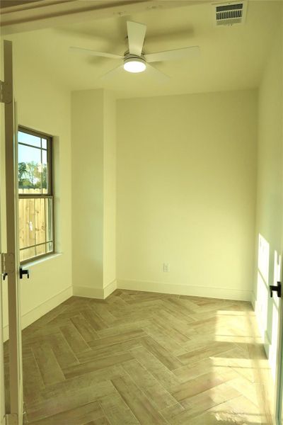 As you step inside, you’ll find a bright flex space to the left, filled with natural light, a ceiling fan, and luxury vinyl flooring—perfect for an office, playroom, or whatever fits your lifestyle. As you step inside, you’ll find a bright flex space to the left, filled with natural light, a ceiling fan, and luxury vinyl flooring—perfect for an office, playroom, or whatever fits your lifestyle.