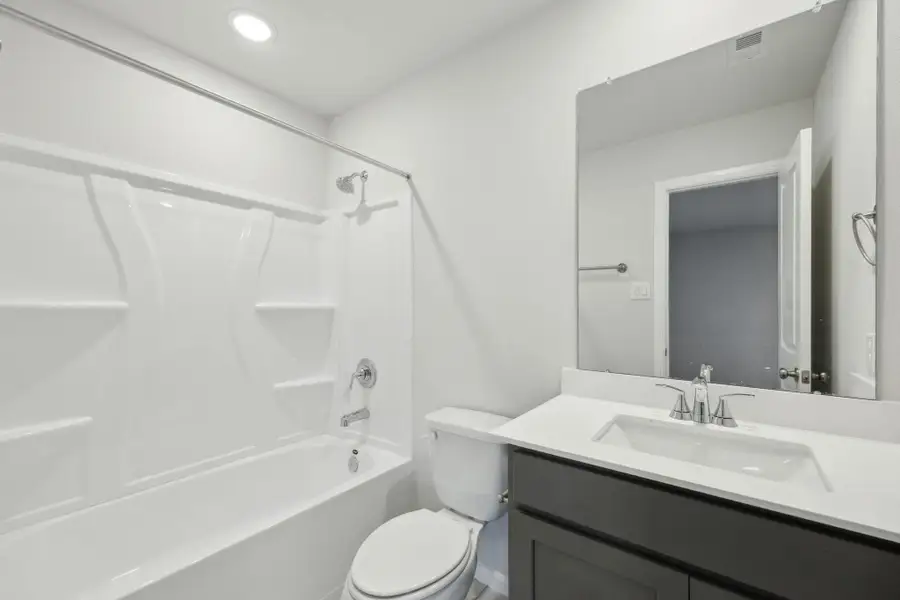 Furnished interior view inside a new home in Saint Tropez, Huffman (Image 8).