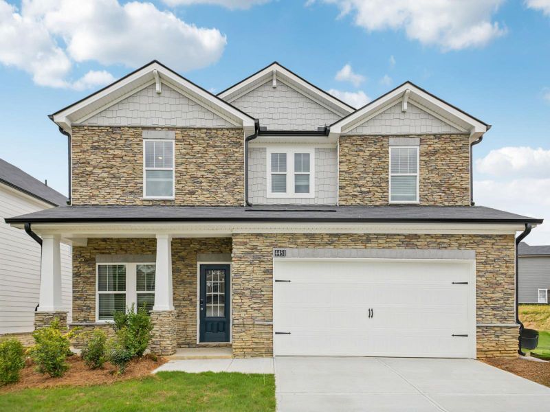 Representative exterior photo of a completed home built from the Dakota by Meritage Homes in Westmont Preserve, Powder Springs, GA (Image 1).