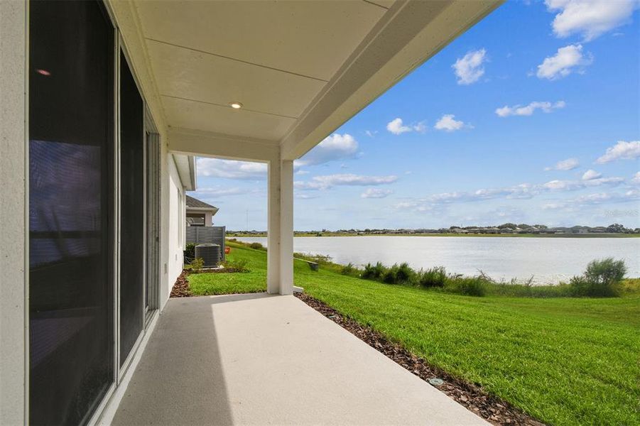 Exterior details and patio area of a home in The Peninsula at Rhodine Lake, Riverview (Image 22).