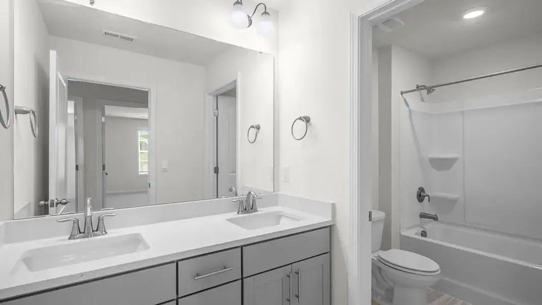 Furnished interior view inside a new home in Horton Park, Apex (Image 9).