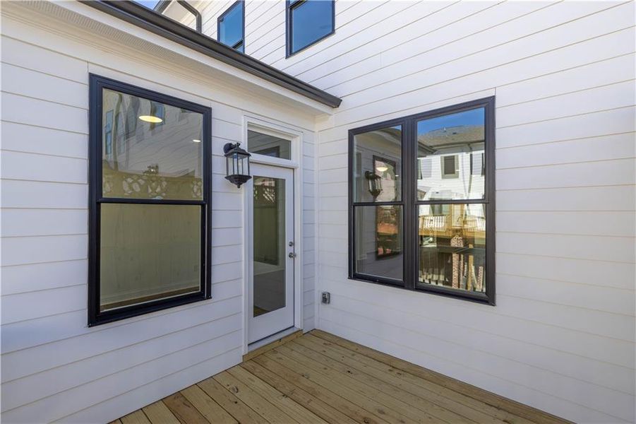 Exterior details and patio area of a home in Millcroft Townhomes, Buford (Image 2). Exterior details and patio area of a home in Millcroft Townhomes, Buford (Image 2).