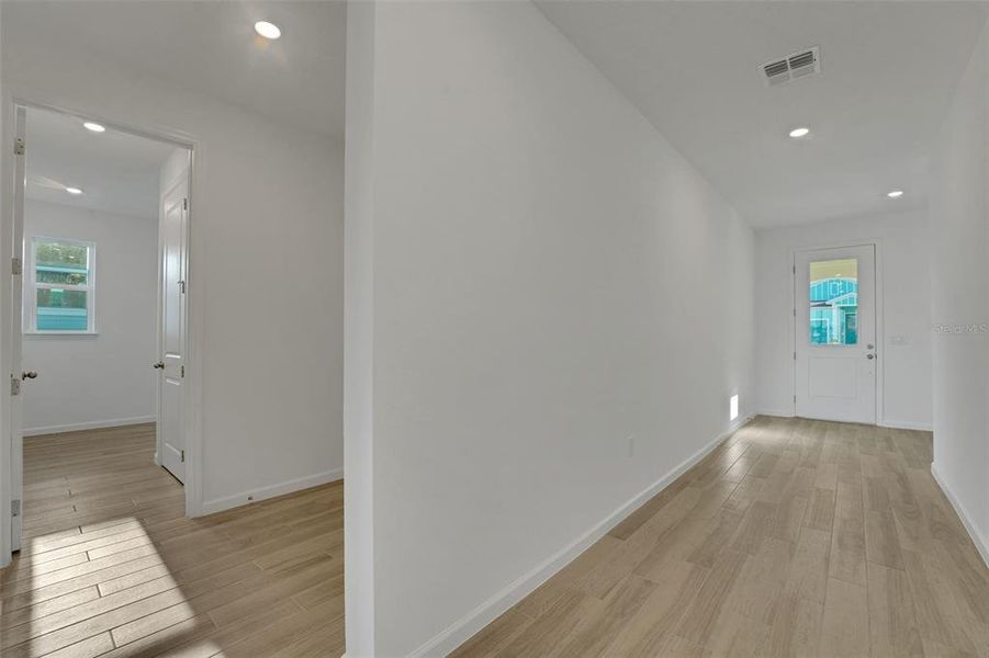 Spacious, unfurnished interior of a new home in Green Key Village, Lady Lake (Image 25).