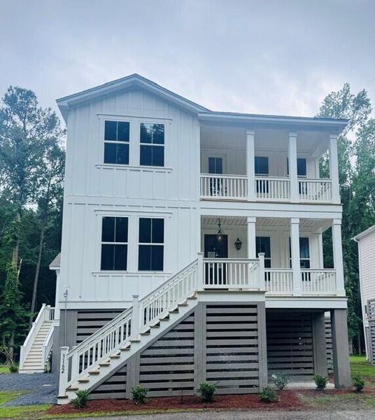 Front exterior of a new home in Waterloo Estates, Johns Island, SC, highlighting curb appeal (Image 1). Front exterior of a new home in Waterloo Estates, Johns Island, SC, highlighting curb appeal (Image 1).