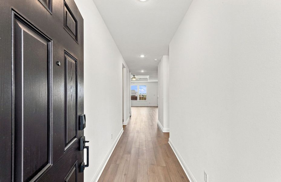 Spacious, unfurnished interior of a new home in Saddleback at Santa Rita Ranch, Liberty Hill (Image 32).