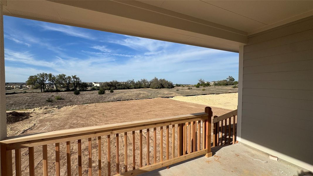 Exterior details and patio area of a home in Cannon Ranch, Dripping Springs (Image 3).