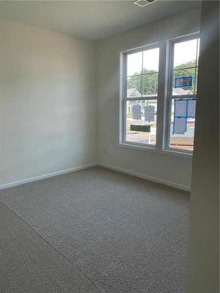 Spacious, unfurnished interior of a new home in Springwood Grove, Central (Image 15).