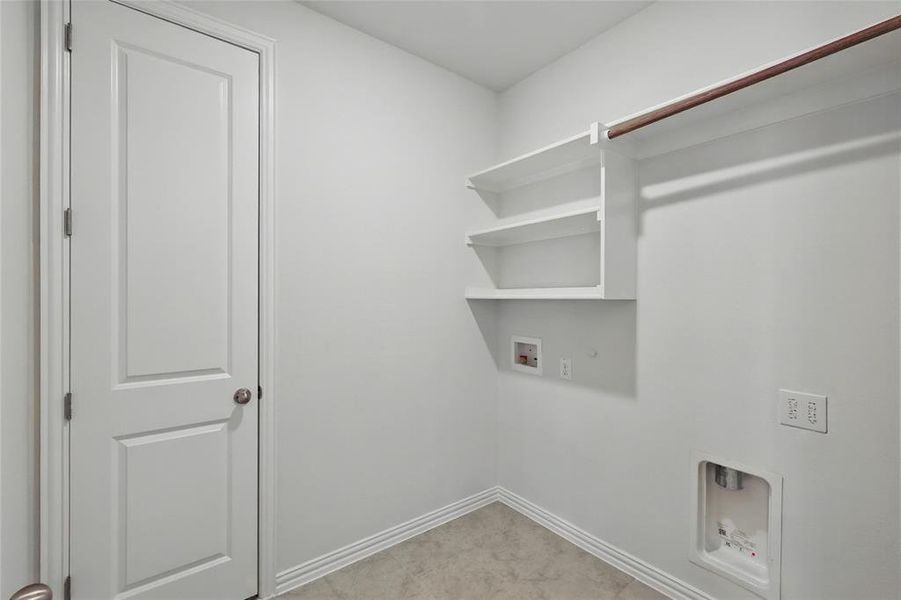 Laundry area featuring laundry area, hookup for a washing machine, baseboards, and hookup for an electric dryer