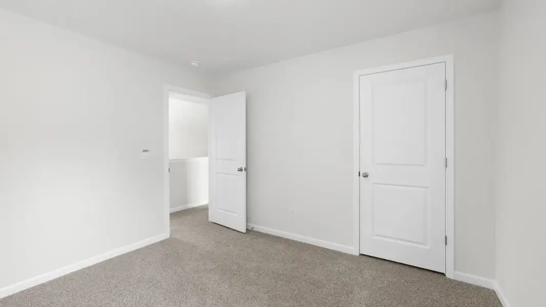 Spacious, unfurnished interior of a new home in Chestnut Ridge, Greenville (Image 31).