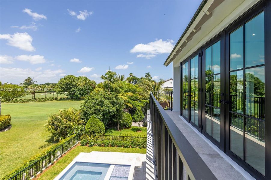 Primary bedroom balcony overlooks gold course Primary bedroom balcony overlooks gold course