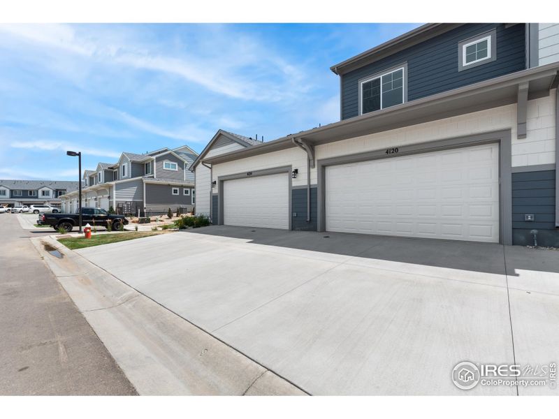 Exterior details and patio area of a home in The Lakes at Centerra - The Shores, Loveland (Image 2).